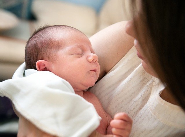 baby in moms arms