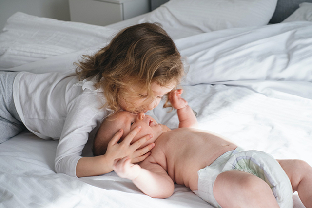 baby with sister photoshoot