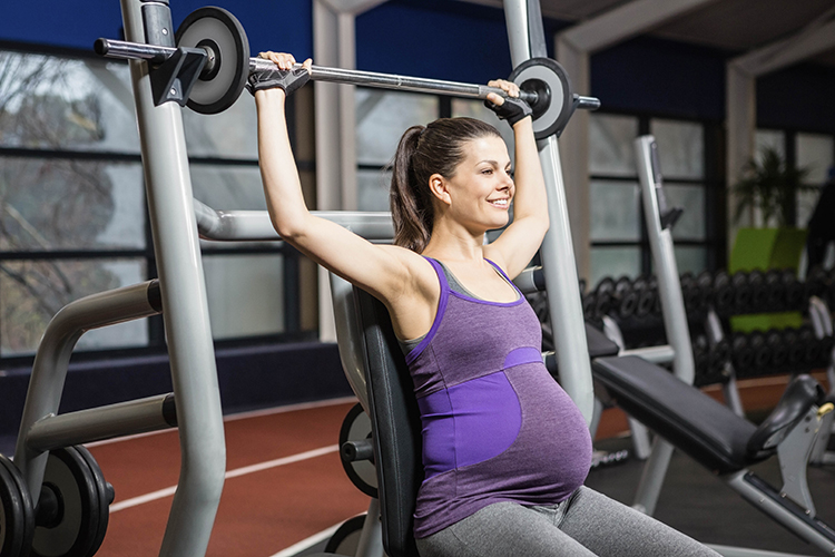 pregnant woman lifting