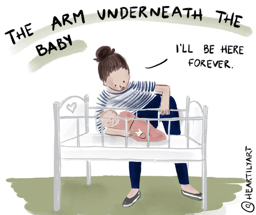 arm under the baby