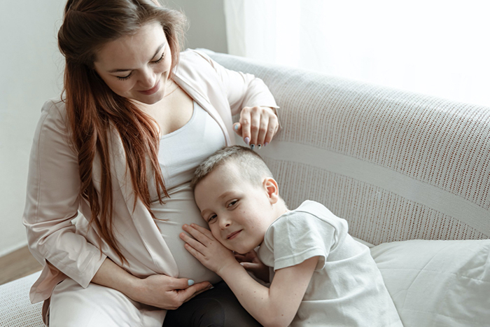 pregnant mom with kid