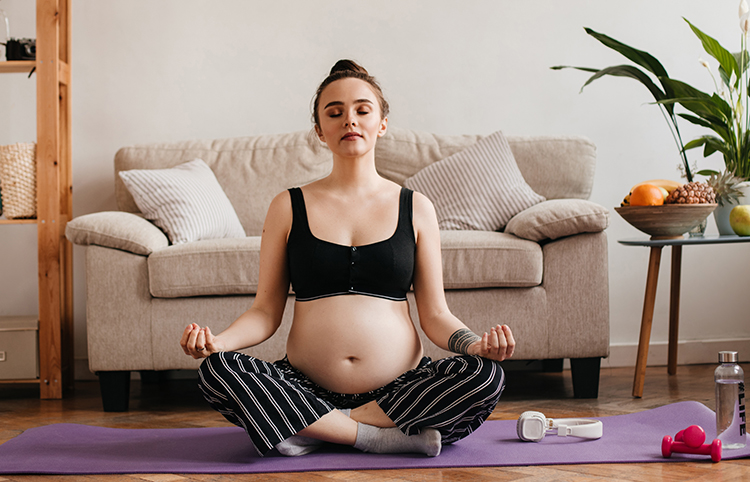 Pregnant woman meditating