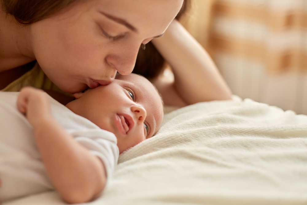 kissing the baby