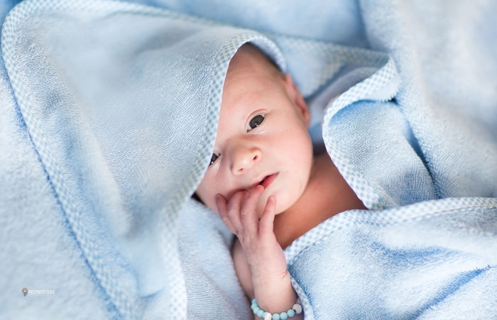 newborn after bath towel